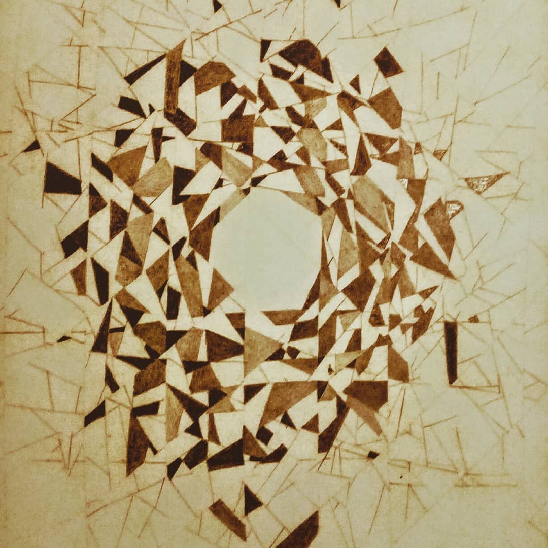 Num. 11, a circular geometric pattern composed of brown angular shapes around an open central space.